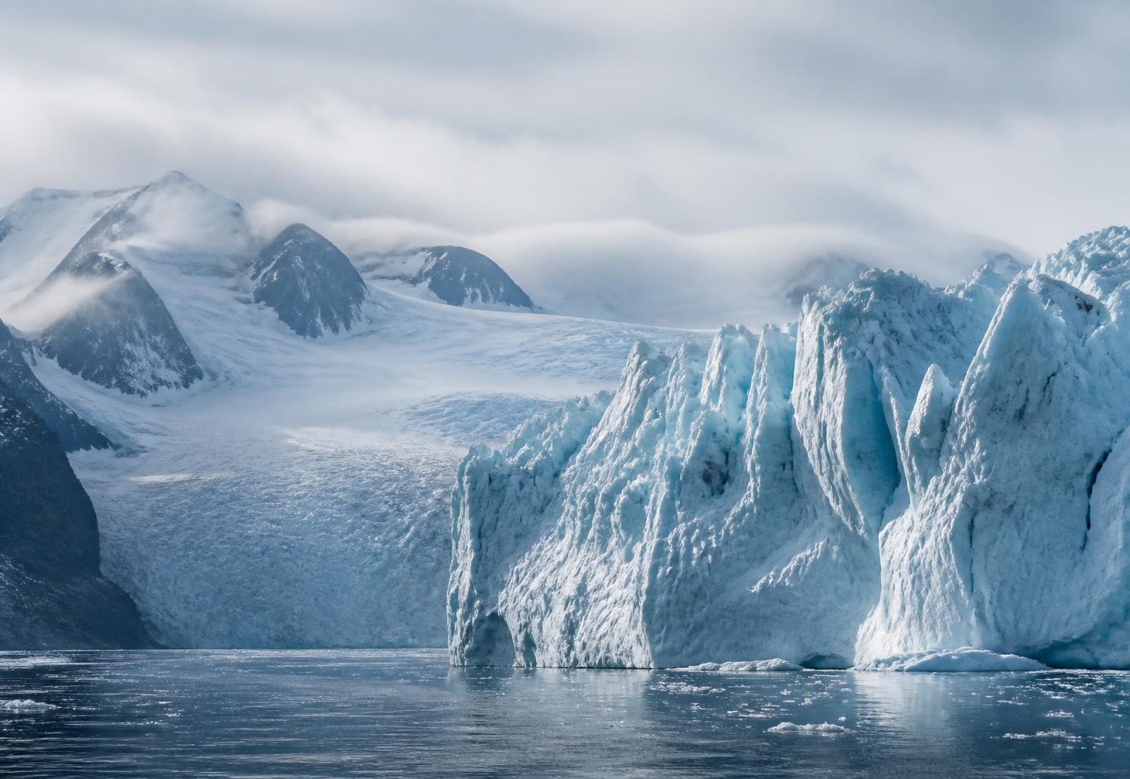 Greenland glacier meeting the fjord